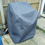 Grey garden furniture cover in acrylic canvas.
