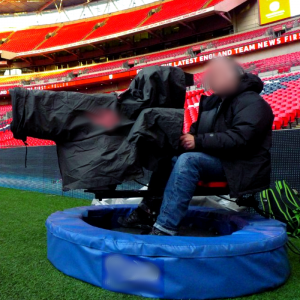 A Pitch-side outdoor broadcast camera protected by a bumper.