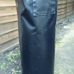 A black pvc gas bottle cover