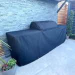A large cover for an outdoor kitchen